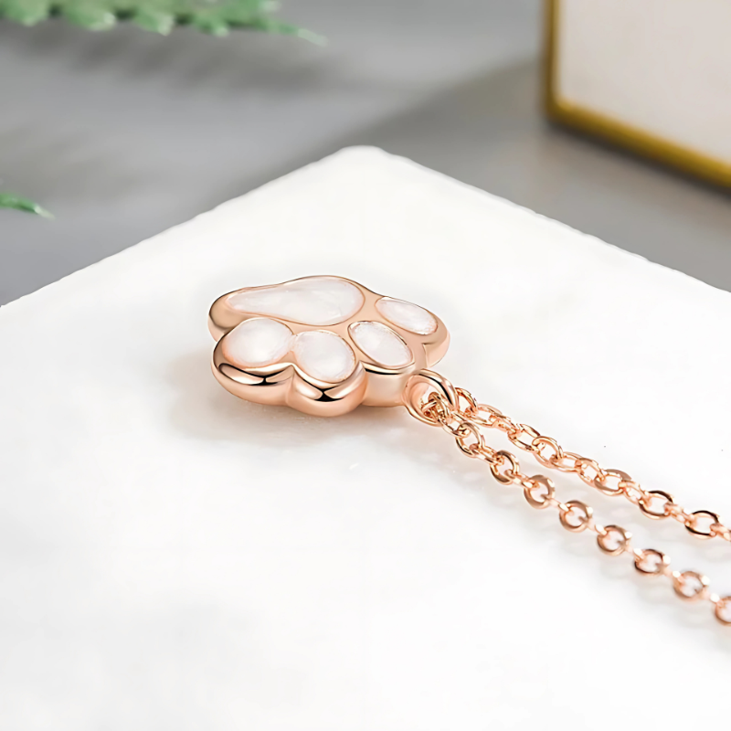 Yanika - Necklace with silver paw pendant